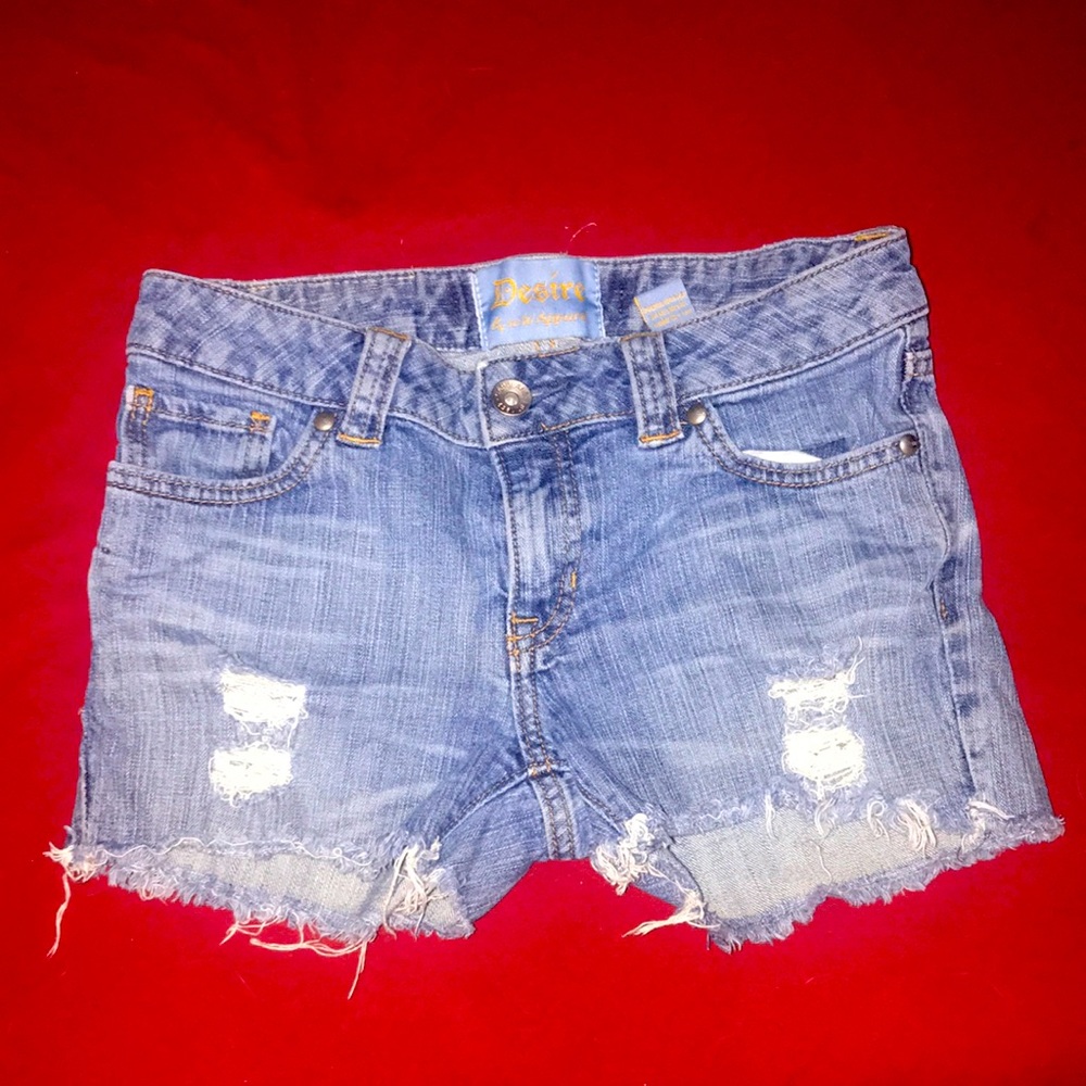 jean shorts with store bought holes.